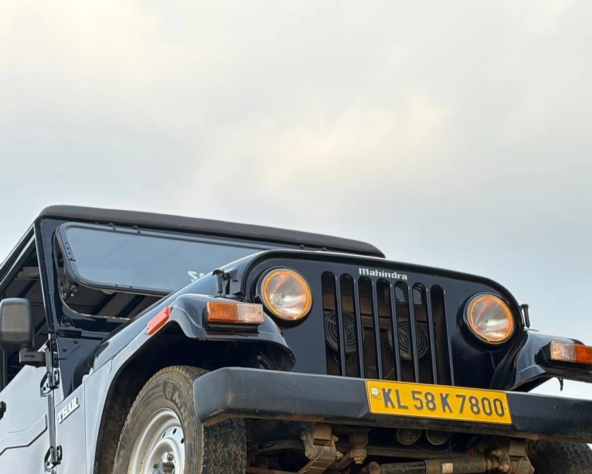 Team Soul Thar headlights under a cloudy sky
